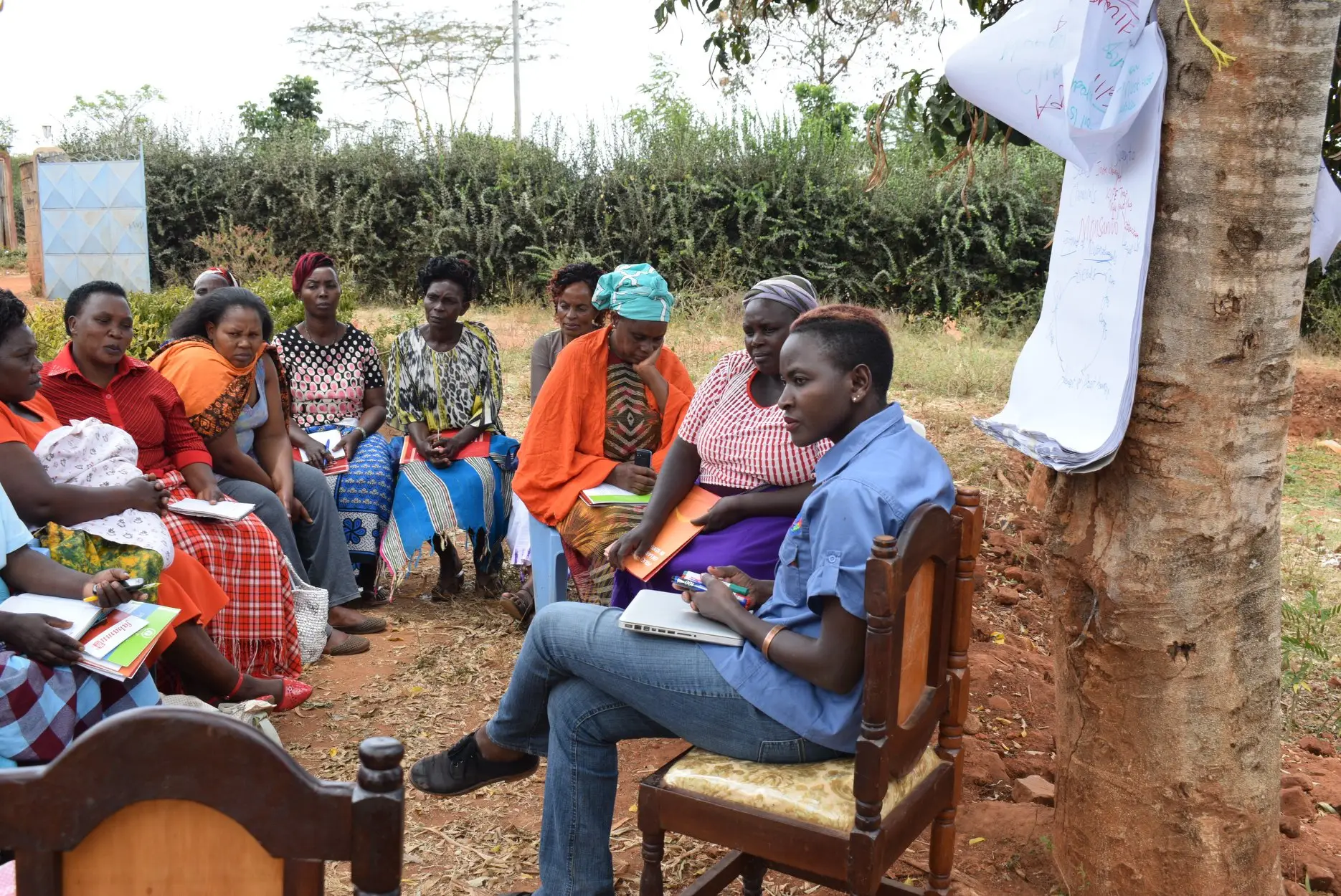 Leonida Odongo facilitating a session with women